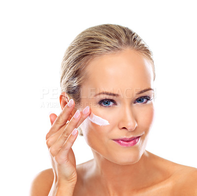 Buy stock photo Portrait, skincare and woman with cream for beauty, glow or makeup in studio isolated on white background. Face, product or model apply lotion, cosmetics and hydration on healthy skin for dermatology