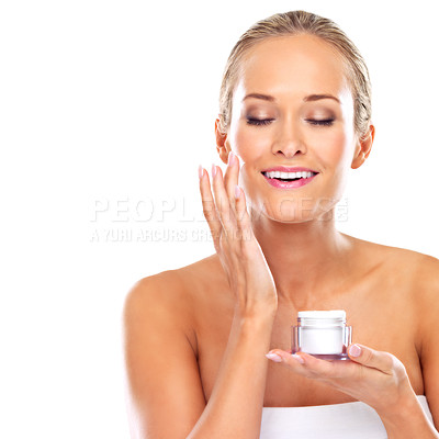 Buy stock photo Woman, moisturizer and skincare cream in studio or health treatment as product, wellness or white background. Female person, finger and face lotion or dermatology self care, mockup space or sunscreen