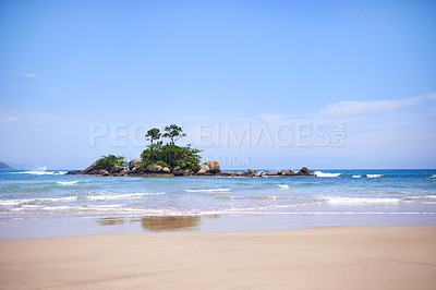 Buy stock photo Blue sky, beach and mountains by ocean for vacation, holiday or adventure for paradise landscape. Travel, nature and sand by waves or sea water on tropical island for outdoor weekend trip in summer.