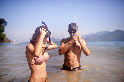 Buy stock photo Scuba diving, water or couple swimming to explore for marine adventure, hobby or vacation activity. Mask, divers or people at sea, beach or ocean for travel, tropical environment or outdoor holiday