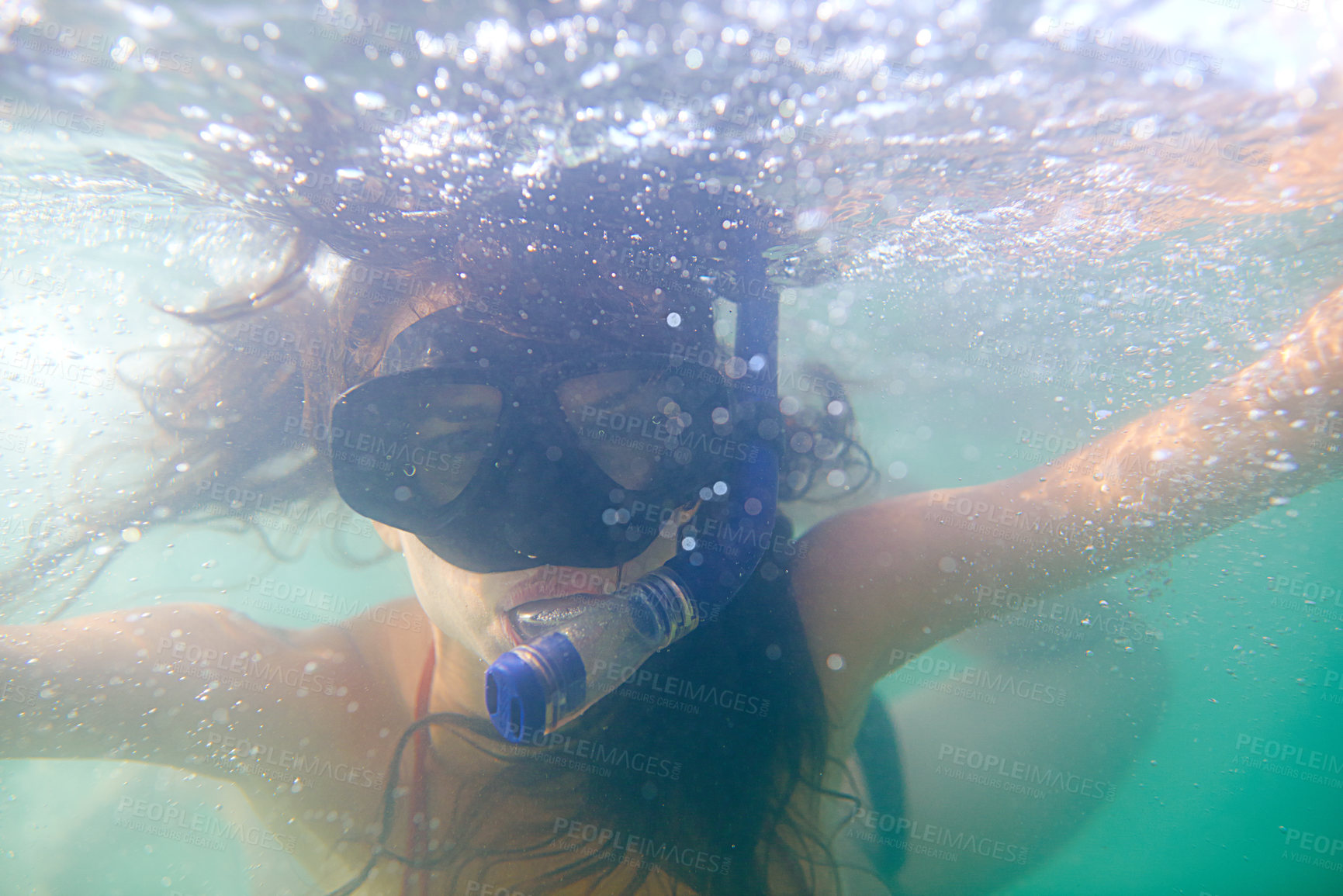 Buy stock photo Woman, snorkeling and swimming on holiday in water, sport and diving for travel, fun and activity. Scuba, diver and mask in underwater, sports and adventure with equipment, pool or reef on vacation