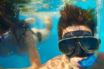 Buy stock photo Scuba diving, underwater or face of couple swimming to explore for marine adventure, vacation or activity. Mask, divers or people at sea or ocean for travel, tropical environment or outdoor holiday