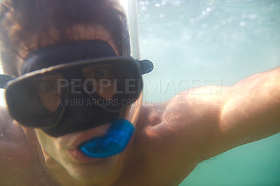 Buy stock photo Man, snorkeling and swimming on holiday vacation on tropical island or underwater, outdoor or explore. Male person, goggles and ocean travel at Florida resort for beach tourism, journey or seaside