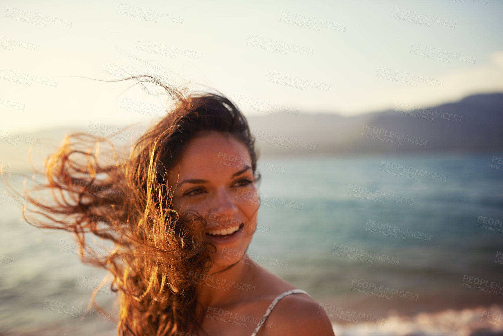 Buy stock photo Happy, beach and woman in summer for holiday, vacation and weekend outdoors at sunset. Nature, travel and face of person with smile for relaxing, adventure and freedom by ocean on tropical island