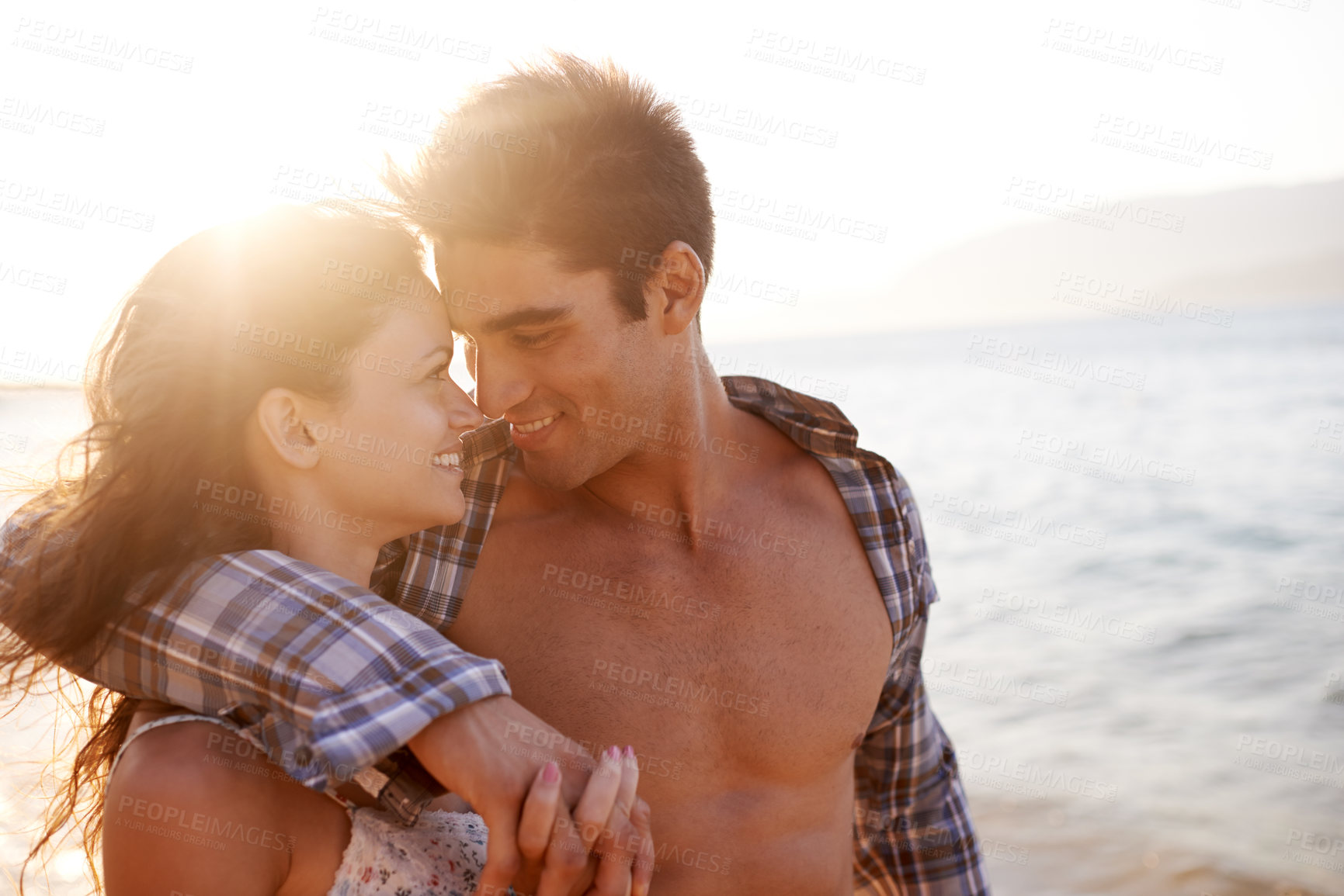 Buy stock photo Beach, hug and couple with holiday, travel and weekend break for honeymoon and summer with journey. Adventure, seaside or embrace with man and woman with holiday and love with anniversary or sunshine