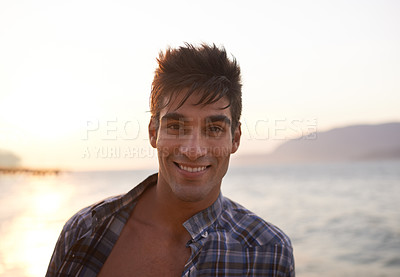 Buy stock photo Happy, beach and portrait of man at sunset for vacation, holiday and weekend outdoors. Nature, travel and face of person with smile for relaxing, adventure and freedom by ocean on tropical island