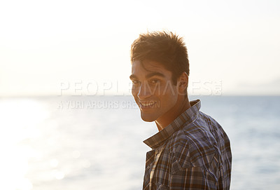 Buy stock photo Happy, beach and portrait of man in summer for vacation, holiday and weekend outdoors. Nature, travel and face of person with smile for relaxing, adventure and freedom by ocean on tropical island