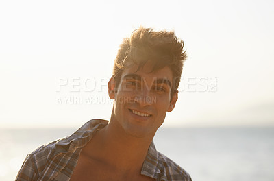 Buy stock photo Happy, ocean and portrait of man in summer for vacation, holiday and weekend outdoors. Nature, travel and face of person with smile for relaxing, adventure and freedom by beach on tropical island