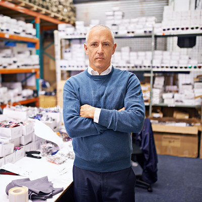 Buy stock photo Portrait, man and confident by shelves in distribution warehouse and pride in career as inspection of stock. Mature face, professional or arms crossed in job or administration of inventory on site