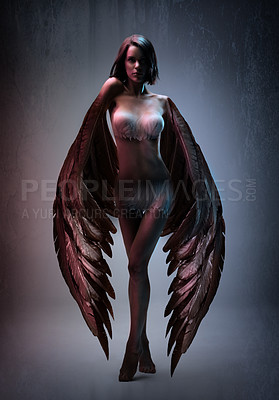 Buy stock photo Conceptual shot of a beautiful woman with black wings