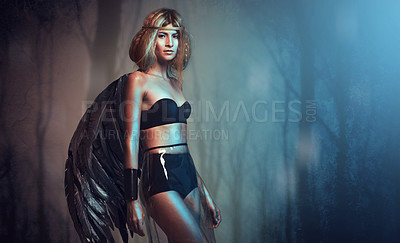Buy stock photo Woman, portrait and angel wings in forest with beauty mythology or whimsical, feathers or fashion. Female person, face and ethereal in nature environment or creative fantasy in woods, goddess or tree