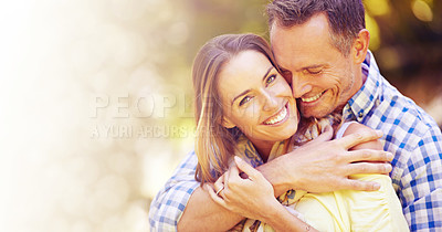 Buy stock photo Portrait, hug and couple in park for summer romance, trees and fun outdoor date with mockup space. Love, mature man and happy woman in garden with morning sunshine, hug and marriage bonding in nature