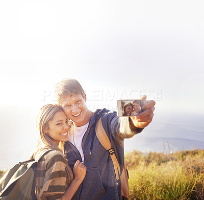Buy stock photo Phone screen, selfie and hiking couple hug in nature for photography, memory or blog profile picture. Smartphone, app and people outdoor with love, happy or smile for social media travel vlog update