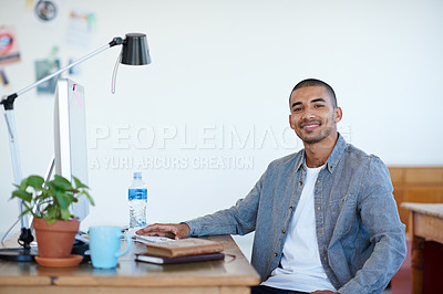 Buy stock photo Professional man, portrait and smile at creative startup, confidence with pride in agency workplace. Confidence, success and career mindset, male person at desk with ambition at advertising firm