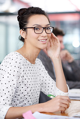 Buy stock photo Happy, portrait and creative woman at desk in office planning with notes for project or report. Professional, employee and person with a smile for productivity, process or work on idea or writing
