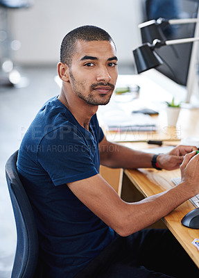 Buy stock photo Portrait, serious and business man at desk in office of creative startup for career or job of male person in Brazil. Face, professional and confident entrepreneur at table, designer and employee