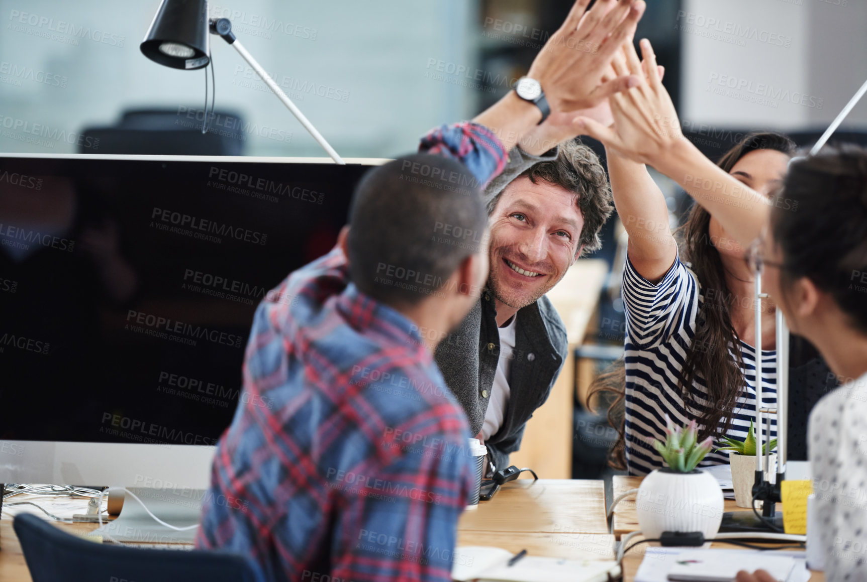 Buy stock photo Business people, teamwork and high five for celebration and goals with computer for startup tech company. Happy employees or group with hands together for achievement, support and news or success