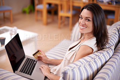 Buy stock photo Portrait, woman and laptop with credit card for online shopping, ecommerce and fintech on sofa. Smile, female person and technology for application, digital payment and internet banking in apartment