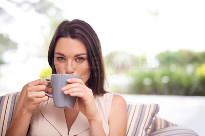Buy stock photo Woman, home and sofa with drinking coffee to relax or chill on break, day off and enjoy. Portrait, female person and happy in living room on couch with cup of tea for peace and calm in lounge.