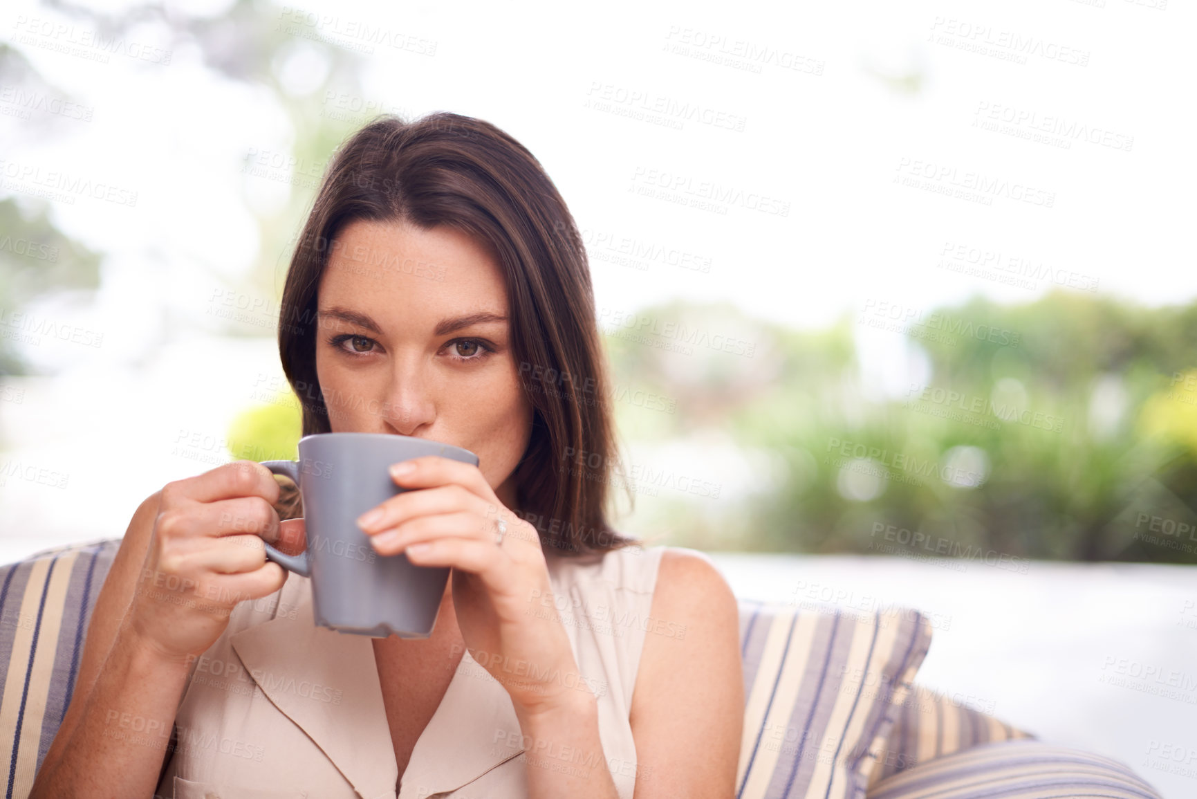 Buy stock photo Woman, home and sofa with drinking coffee to relax or chill on break, day off and enjoy. Portrait, female person and happy in living room on couch with cup of tea for peace and calm in lounge.