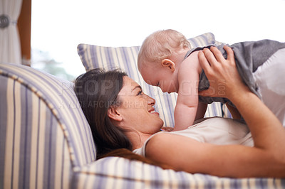 Buy stock photo love, smile and mother with baby on sofa for happiness, relax and bonding in living room together. Family, hug and mom with girl toddler couch for childcare, security and parenting in apartment