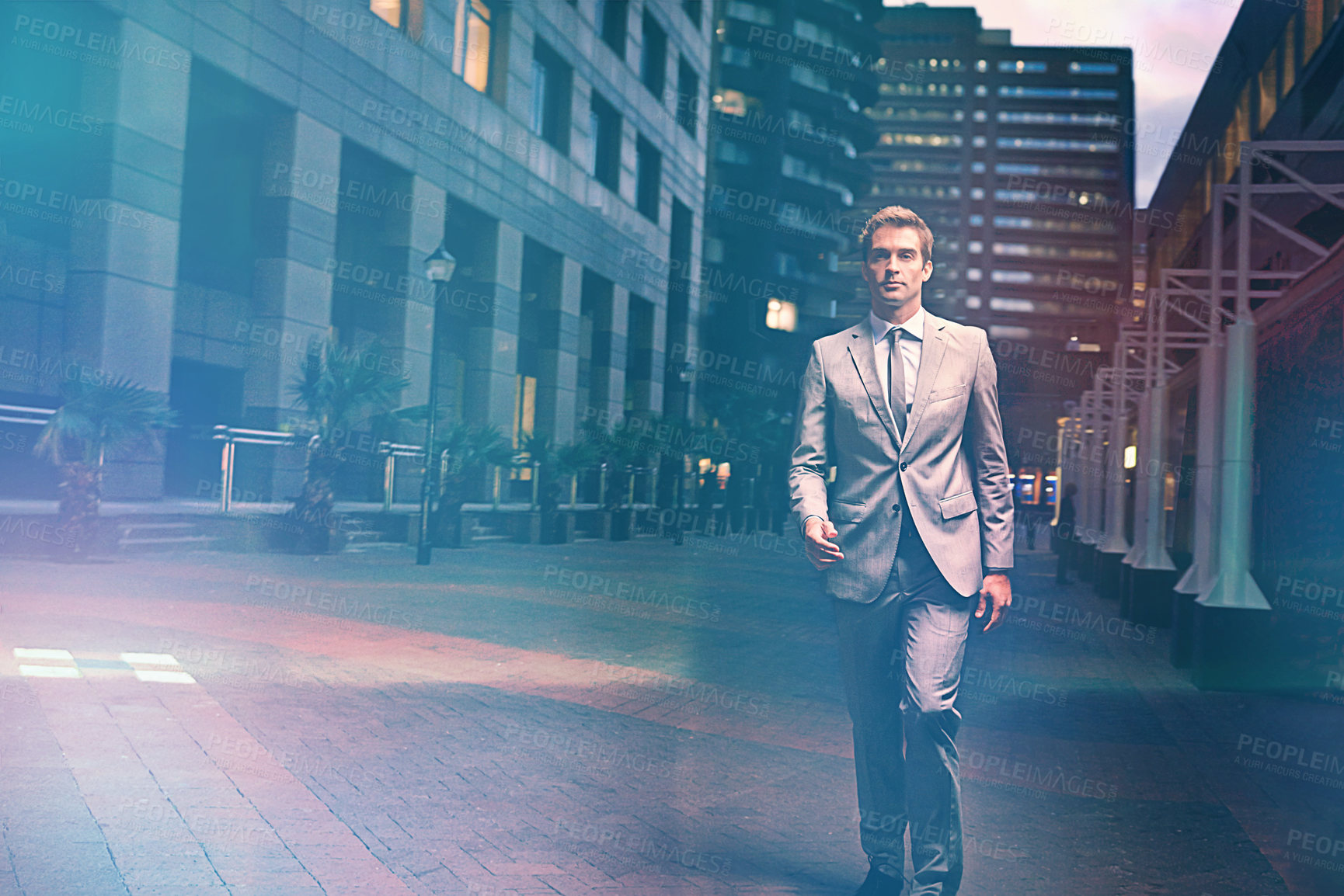 Buy stock photo Business, travel and man walking in a city at night with confidence, mindset and focus on urban background. Evening, trip and entrepreneur in Chicago for job opportunity, immigration or startup goal