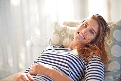 Buy stock photo Lady, portrait and smile with lounge, rest and break in apartment living room. Happy woman, sofa and home with happiness, satisfaction and positivity for carefree peace and mental health wellness