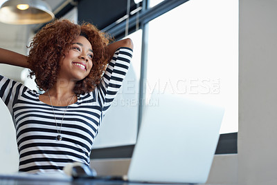 Buy stock photo Cropped shot of a young businesswoman using wireless technology in an office