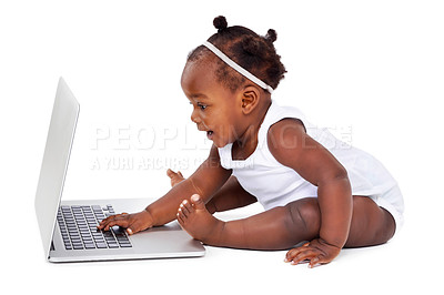 Buy stock photo African baby in studio with laptop on white background for learning, development or growth or milestones with computer. Girl, backdrop or technology, curious or childhood education or formation