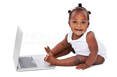 Buy stock photo Studio shot of an adorable baby girl using a laptop isolated on white