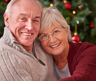 Buy stock photo Senior couple, portrait and happy christmas in home, house and happiness, love and care together for winter holiday. Man, woman and old people, retirement and festive, merry xmas and celebration joy 