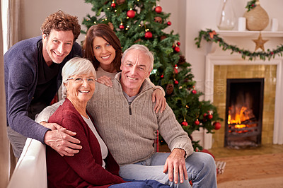 Buy stock photo Christmas, happy family and portrait on sofa, living room and lounge, celebration and festive holiday. Big family celebrate xmas together with love, care and quality time, relax and smile in lounge 