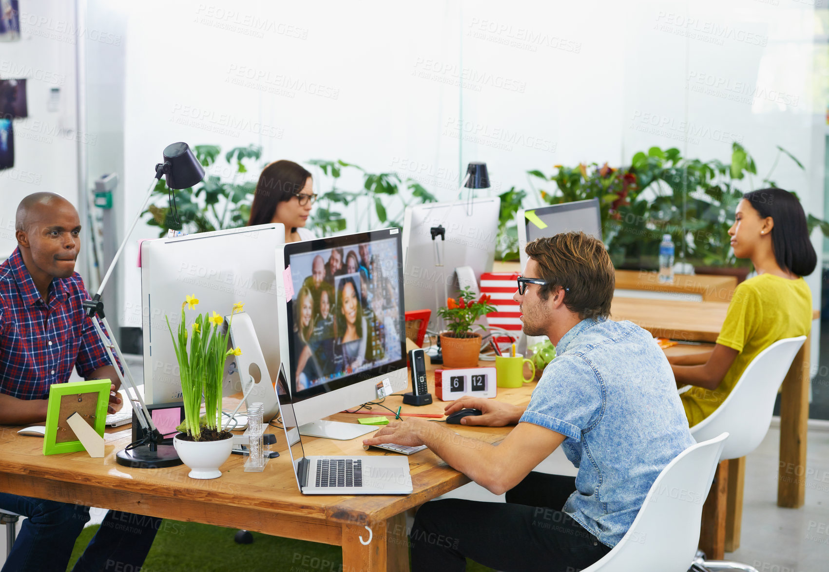 Buy stock photo Shot of a young designers at work in an office
