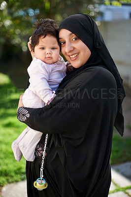 Buy stock photo Muslim, woman and baby with smile outdoor, portrait in garden with mother and child for Eid celebration. Motherhood, family and Islamic holiday with hijab, infant and happy in backyard for bonding