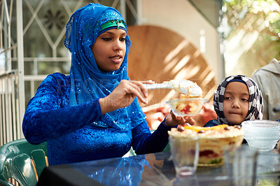 Buy stock photo Family, muslim and table with dessert for ramadan or eid for religious holiday, celebration and eating at home. Islam, traditional and people with hijab for festival, culture and food for fasting