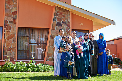 Buy stock photo Home, portrait and family of muslim people, outside and house with smile for Eid celebration. Garden, lawn and islamic woman with hijab, generations and household for religious holiday after ramadan