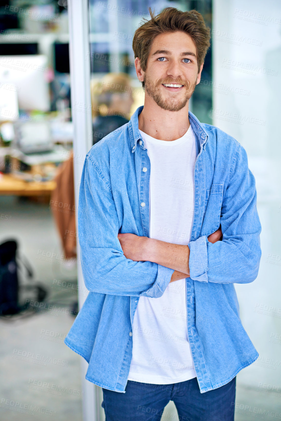 Buy stock photo Cropped shot of a handsome young designer in his office