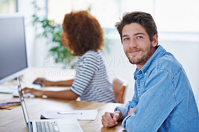 Buy stock photo Man, portrait and laptop in office at desk, smiling and male person working or technology device for web search. Online computer and company, colleagues together and people sitting in workspace
 