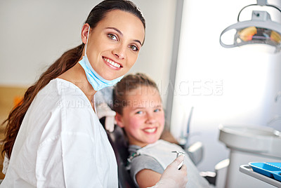 Buy stock photo Young girl and dentist with smile in office on chair, appointment or results in consulting room. Professional, child and dental work, oral hygiene or working or care with tools, patient or calm