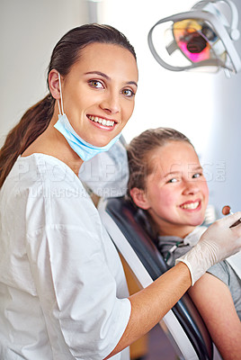 Buy stock photo Portrait of an attractive female dentist and her child patient