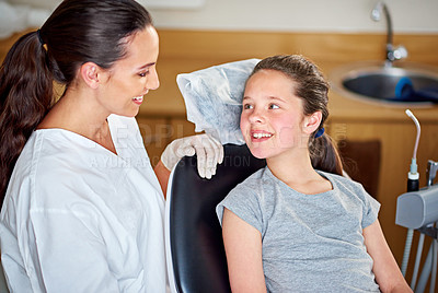 Buy stock photo Smile, dentist and woman with child for consultation for healthcare, wellness and orthodontics in clinic. Dental hygiene, doctor and happy kid, patient and pediatrician for medical exam of teeth