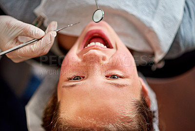 Buy stock photo Dentist, mirror and child with teeth for cleaning and happy with healthcare at clinic or hospital. Dental, care and kid with tools in mouth and orthodontics patient with trust in medical appointment