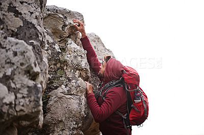 Buy stock photo Man, mountain and rock climbing in nature for fitness, wellness and exercise for training and adventure in environment. Young person with backpack and bouldering for workout and trekking in morning