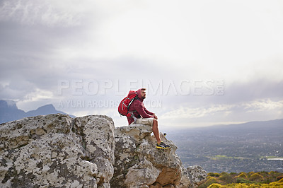 Buy stock photo Man, cliff and thinking on outdoor hike in nature, mountain and peace or calm on rocks for wellness. Person, exercise and travel with backpack on vacation, inspiration and explore bush for fitness