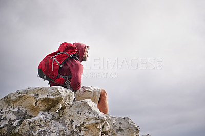 Buy stock photo Man, mountain and think on nature hike for calm, cliff and peace or inspiration on rocks for wellness. Person, exercise and travel with backpack on vacation, adventure and relax on cliff for health