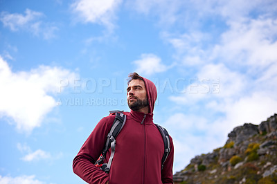 Buy stock photo Blue sky, hiking and man on mountain, thinking and outdoor in nature for adventure, peace and travel. Contemplation, calm and male person in vacation, thoughtful and journey for holiday and backpack