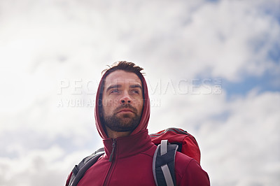 Buy stock photo Sky, thinking and man with backpack, hiking or camping in nature for adventure and peace. Contemplation, vacation and male person in trip, thoughtful and journey for holiday and break to relax