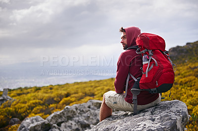 Buy stock photo Man, rock and relax on outdoor hike in nature, mountain and peace or calm in wellness. Male person, exercise and travel with backpack on vacation or holiday, adventure and explore bush for fitness