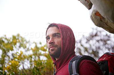 Buy stock photo Man, tree and hiking in nature for fitness, wellness and exercise for training and adventure in environment. Young person with backpack in mountain for workout and trekking in morning for travel