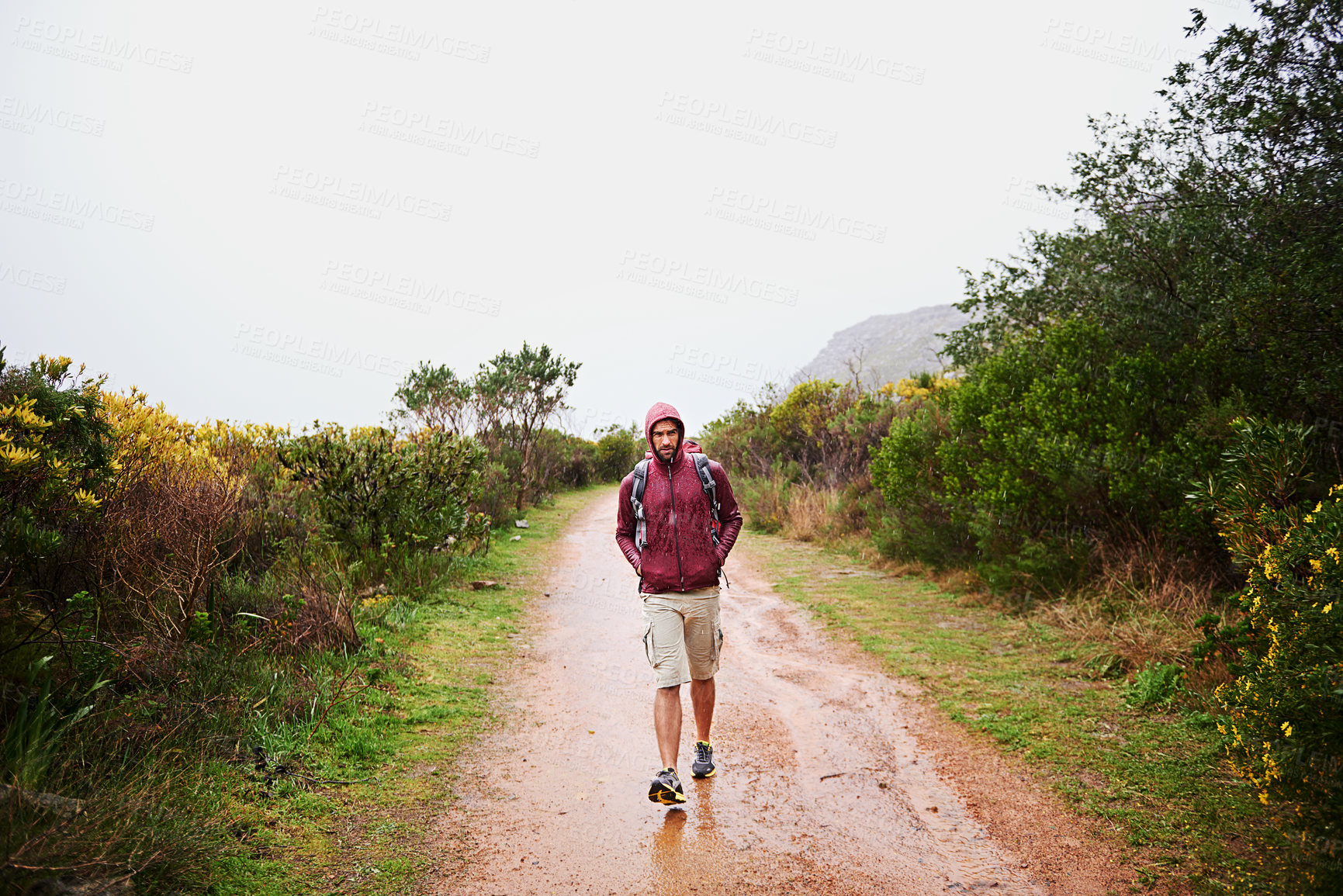 Buy stock photo Hiking, man and walk outdoor for travel, backpack and nature for fresh air and fitness on path for trip. Trekking, mountain trail and rough terrain for adventure, journey and exercise in environment